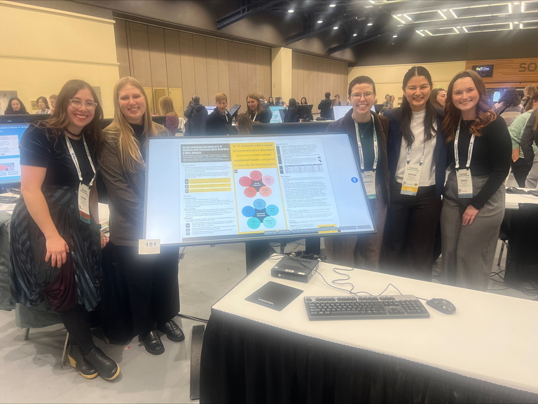 CSD students presenting during a poster session