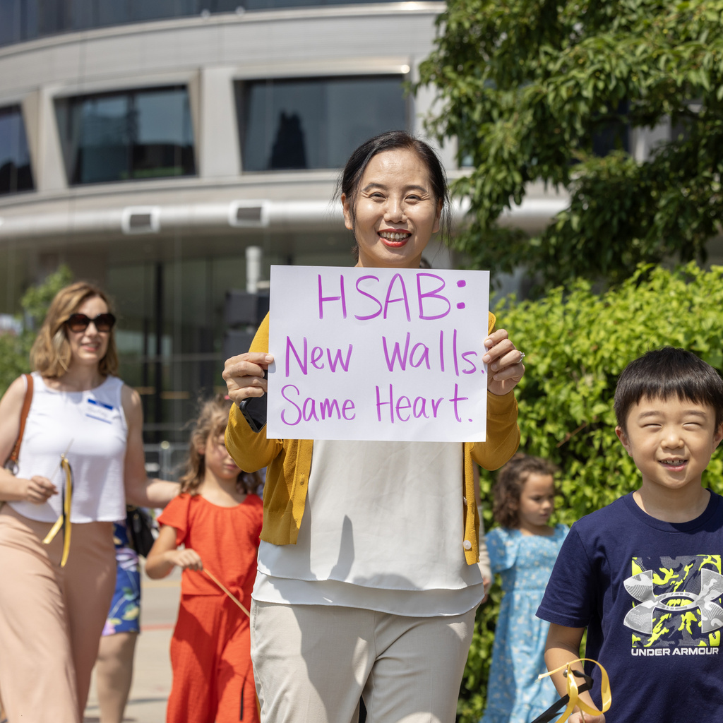 Family with signs at WenJo parade