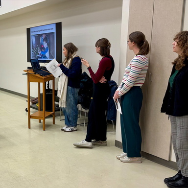 A group of SLP graduate students present to local paratransit drivers.