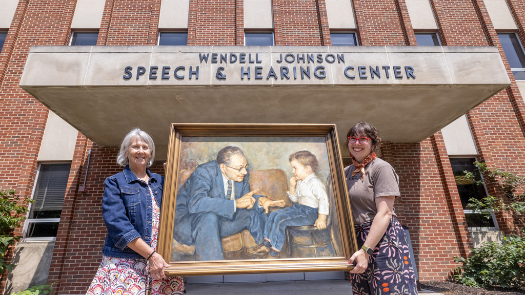 Naomi Rogers and female with painting in front of WenJo
